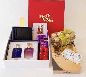Premium wedding gift hamper with the Couple Perfume ,Chocolates and more with blissful greetings!