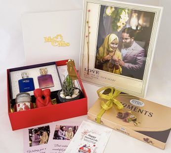 Premium wedding gift hamper with the Couple Perfume ,Plant and more with blissful greetings!