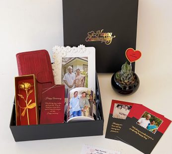 Elegant  Anniversary gift hamper with a Frame , Mug and blissful greetings