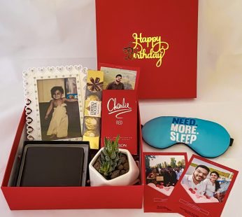 Premium Birthday gift hamper with frame, wallet and a sweet greetings.