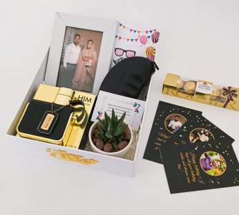 Premium Birthday gift hamper with Frame, Sunglasses and a sweet greetings.