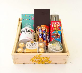Elegant Birthday gift hamper with Chocolates ,Pot and a sweet greetings.