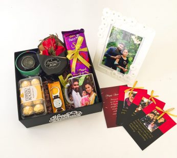 Luxury Birthday gift hamper with Key Chain, Watch and a sweet greetings.