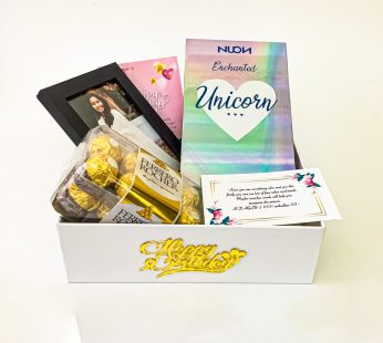 Elegant Birthday gift hamper with lovely Frame, Perfume and a sweet greetings.