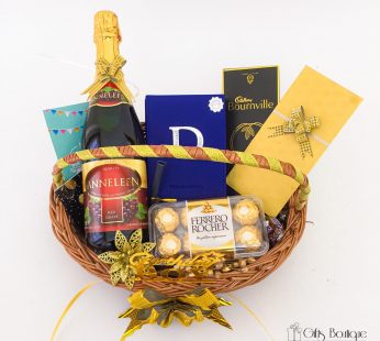Delightful Birthday gift hamper with Tasty wine, Perfume and a sweet greetings.