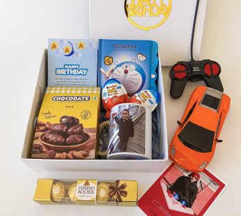 Elegant Birthday gift hamper with kids diary, chocolate box and a sweet greetings.