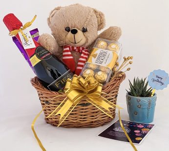 Delightful first birthday gift for wife with Tasty wine, teddy bear, and a sweet greetings