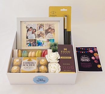 Elegant Birthday gift hamper with lovely frame ,macrons and a sweet greetings.