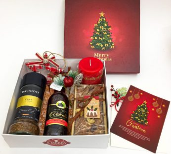 vintage christmas hamper with perfumes candle and happy xmas wishes card