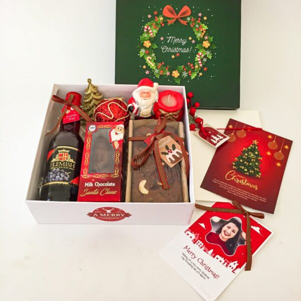 Minimalistic Christmas cake boxes Filled With Rich Plum Cake, Chocolates Grape Juice, And Decor Items - Image 5