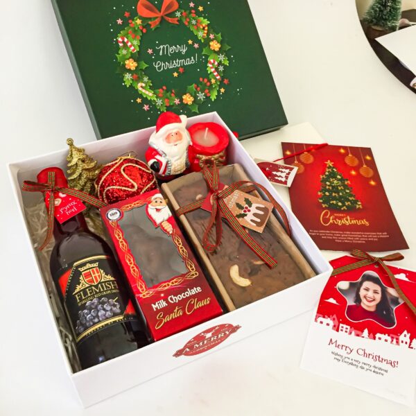 Minimalistic Christmas cake boxes Filled With Rich Plum Cake, Chocolates Grape Juice, And Decor Items - Image 3