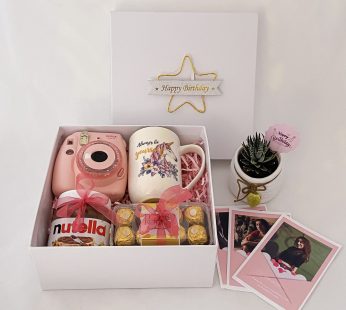 : Luxury B bday gifts for wife gift hamper with Instax camera, Plant and a sweet greetings.