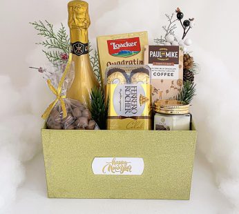 Delightful new year gifts hamper with milk chocolate, Ferrero Rocher, candle
