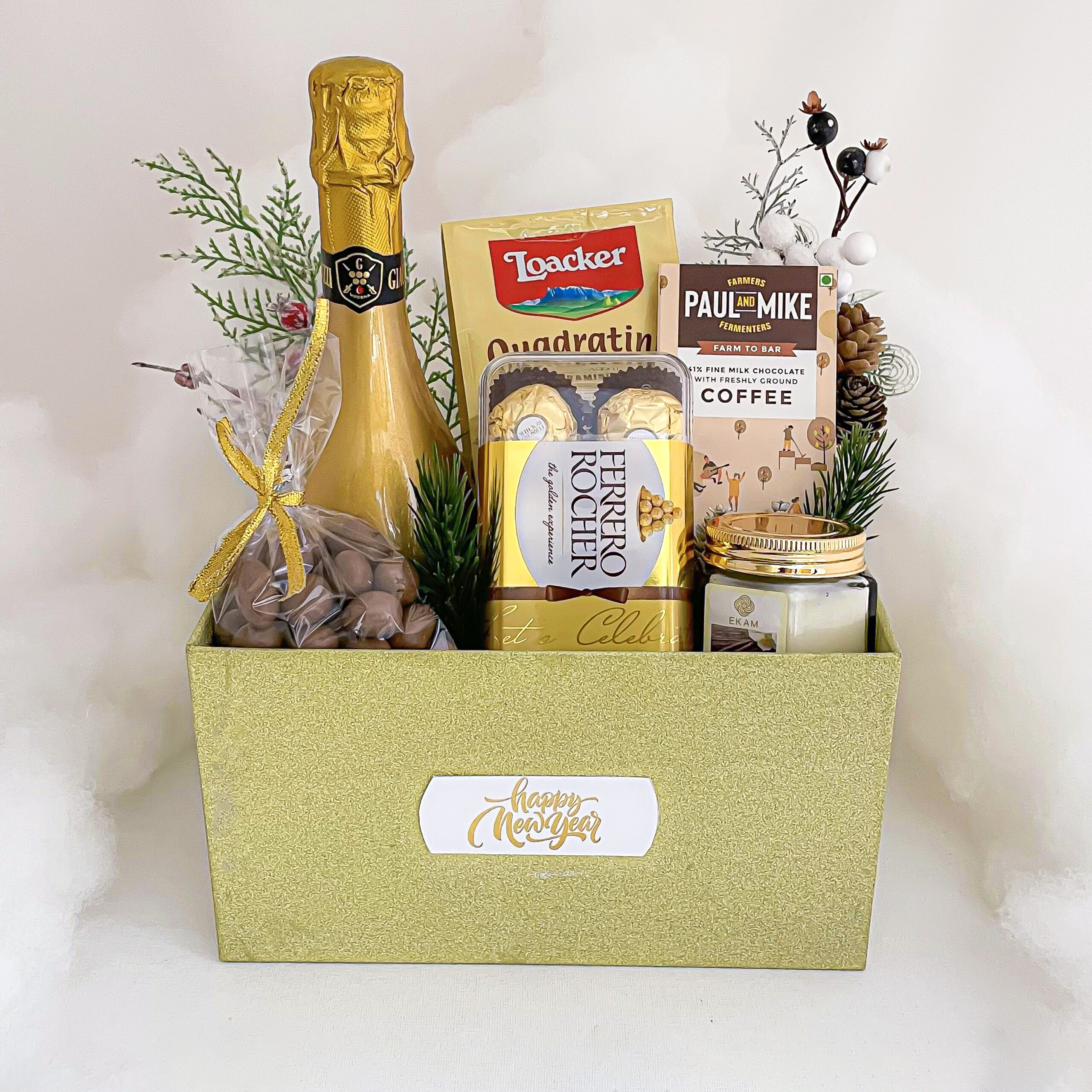Festive Easter gift hamper with premium chocolates, chocolate coated dry fruits, wine and more