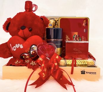Heart warming luxury valentines day hamper with elegant Teddy, Toblerone, Chocolates, and more
