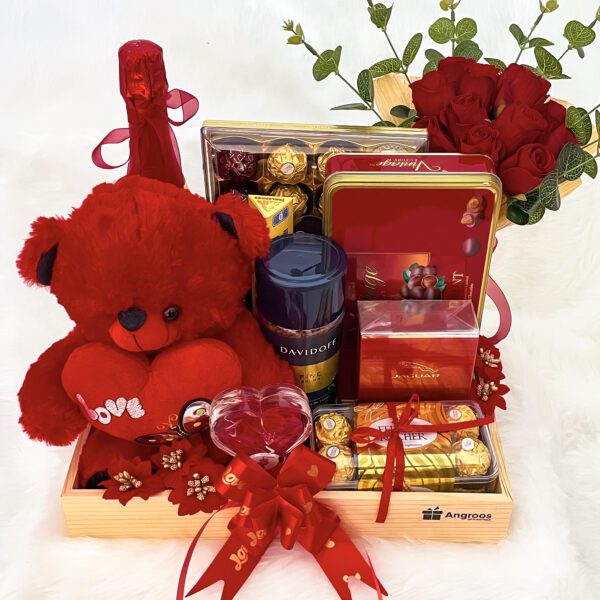 Premium anniversary gifts for her were decorated with teddy, chocolates, and flowers. - Image 4