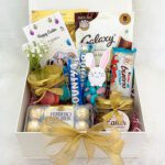 A festive Easter gift hampers filled with delicious treats and goodies, including chocolates, candy, and more