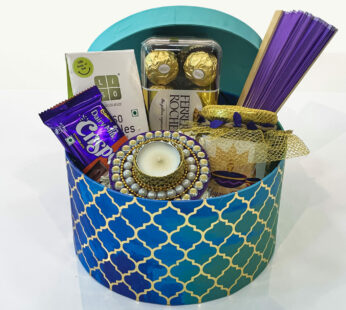 Special corporate Diwali gifts with Dairy milk silk, golden tea mugs, Ferrero rocker chocolates and a Mixed nuts jar