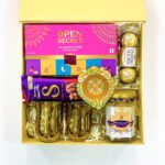 Dame Fortune Diwali gift hampers With Assorted Cookies, Chocolates, Mugs, And Diya