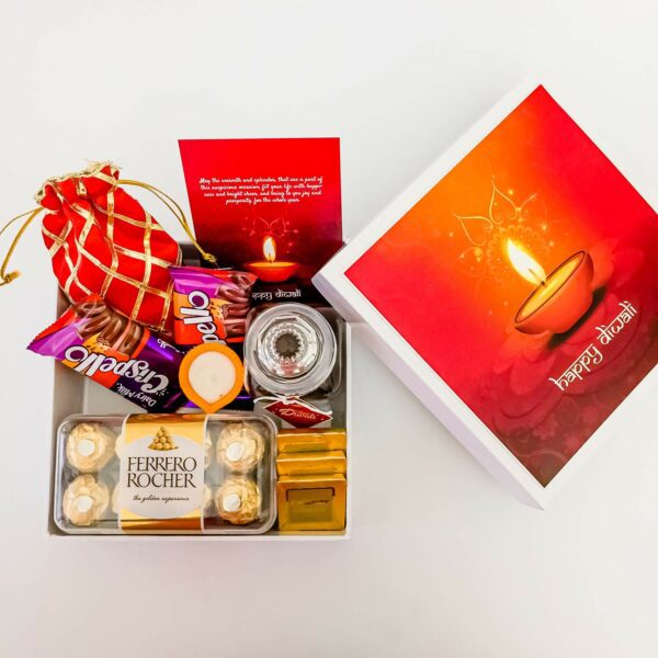 One-Of-A-Kind Colorful Diwali gifts Treats With Chocolates, Dry Fruits, And Diya