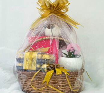 Special and cute gifts for wife adorned with small teddy, chocolates, and cards