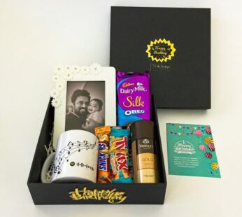 staggering birthday gift box for him filled with chocolates, perfume, and greetings