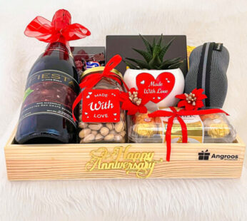 Graceful anniversary premium hampers for friends with chocolates, wine, and more