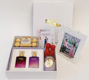 Blissful wedding gift ideas for couple contains perfumes, candle, and chocolates
