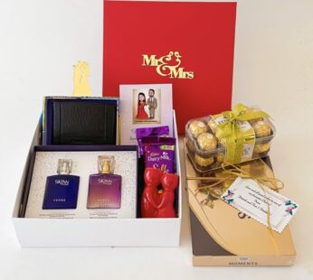 A blissful wedding gift for married couple contains a wallet, chocolates, & perfumes