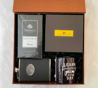 A special gift for boyfriend’s birthday includes perfume, a customized mug, belt