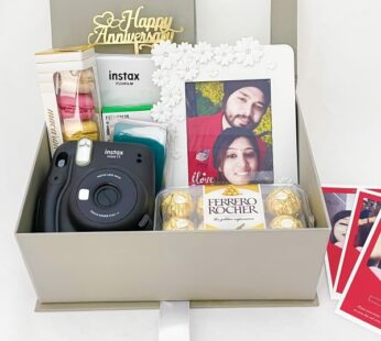 1 year anniversary gifts for husband contain sweets, a camera, and a photo frame
