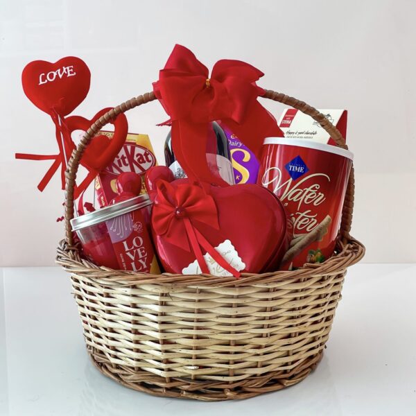 Affectionate anniversary gift hamper for her contains chocolates, grape juice & more - Image 2