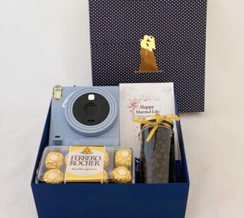 A truly luxurious gift for friend groom to be, with camera, chocolates, and more