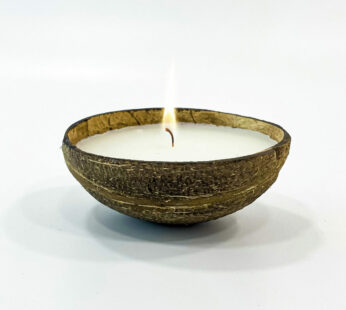 Spread the light with this traditional handcrafted coconut shell candle (Width 3.5 In, Height 4.25 In.)