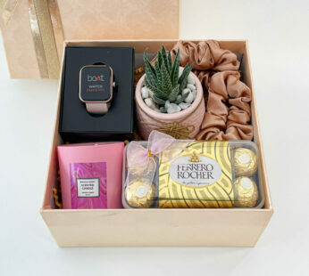 Cherished thank-you gift for women filled with smartwatch, mini plant, and chocolates