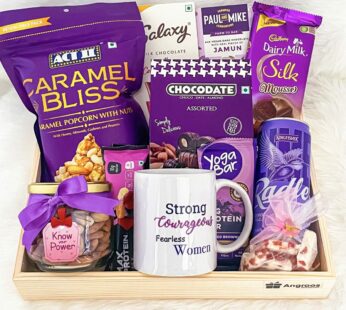 Delectable Birthday gift for mother from daughter with chocolates, nuts, and more