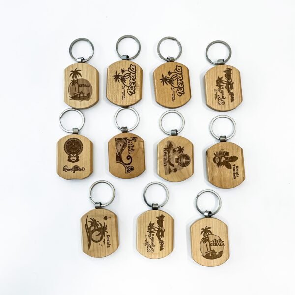 Wooden Kerala keychains ( 12 types ) with a height of 4cm, a width of 5cm, and a length of 1cm - Image 2