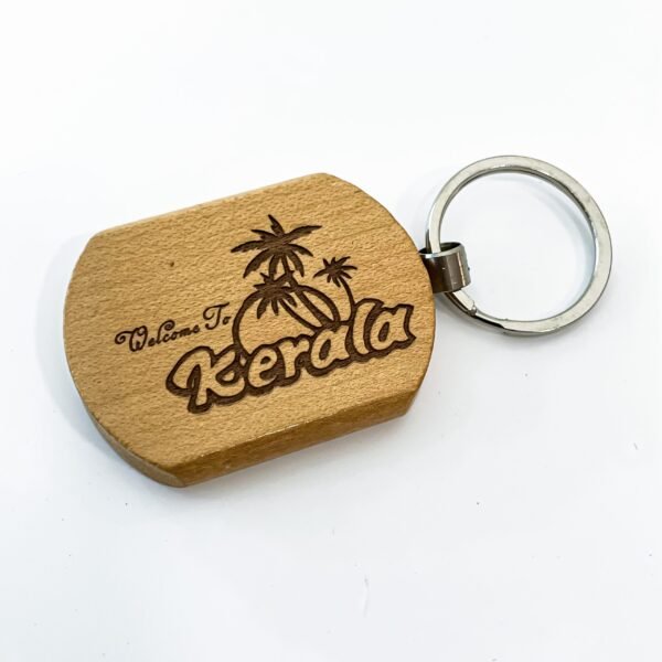 Wooden Kerala keychains ( 12 types ) with a height of 4cm, a width of 5cm, and a length of 1cm - Image 3