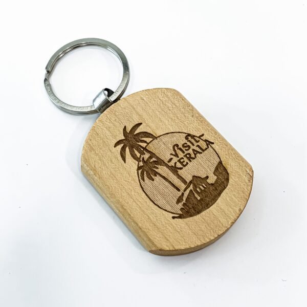Wooden Kerala keychains ( 12 types ) with a height of 4cm, a width of 5cm, and a length of 1cm - Image 4