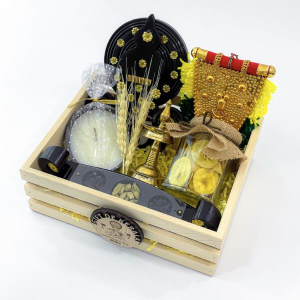 Delightful Onam traditional gifts filled with Nilavilakku, Kathakali face, and more - Image 2