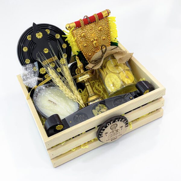 Delightful Onam traditional gifts filled with Nilavilakku, Kathakali face, and more - Image 3