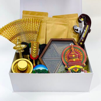 Cherish Traditions with the finest Onam gift that contains Nilavilakku, Udayada, and more