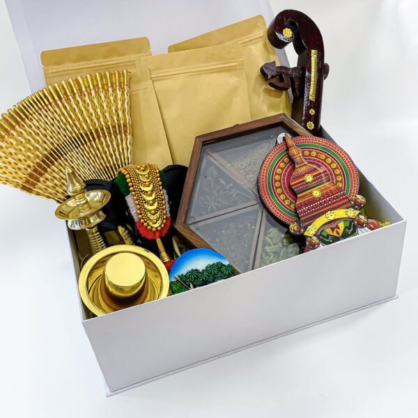 Cherish Traditions with the finest Onam gift that contains Nilavilakku, Udayada, and more - Image 3