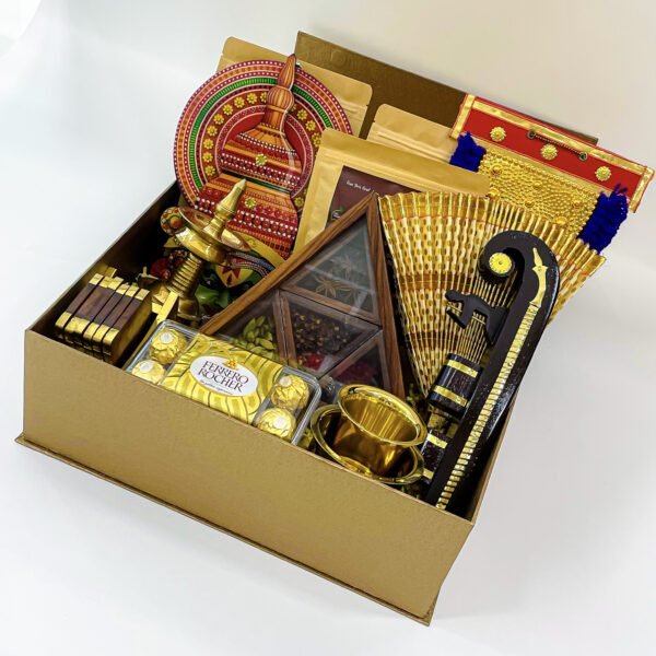 Grandeur Onam gift hamper decorated with a Nettipattam, Nilavilakku, udayada, and more - Image 3