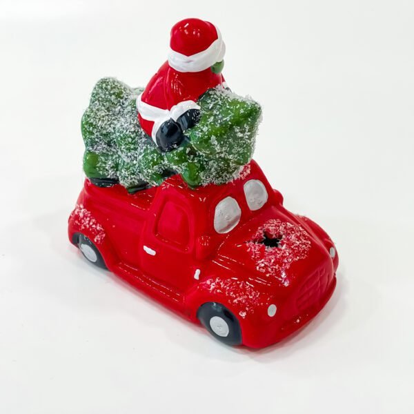 ceramic santa claus in car