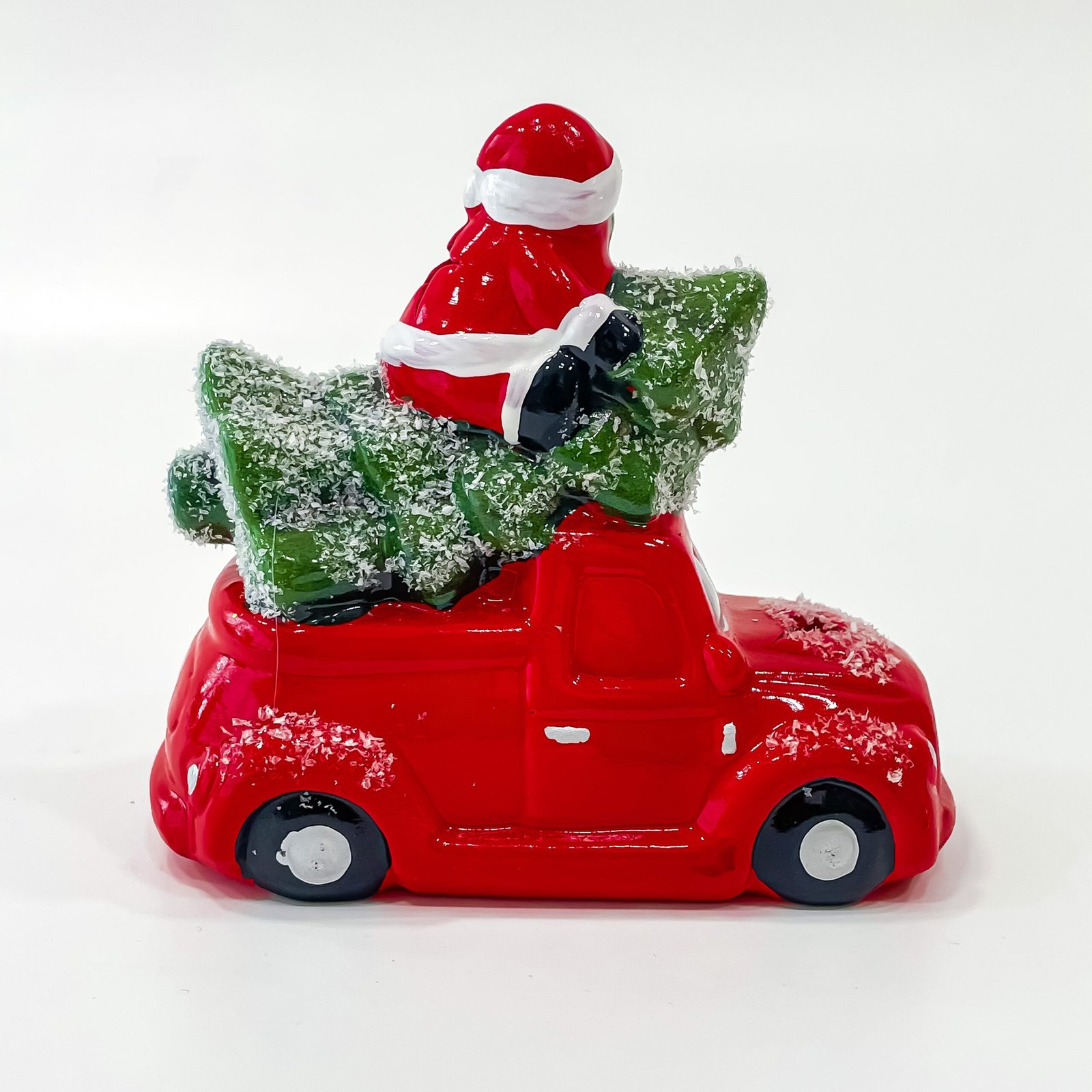 ceramic Santa in car