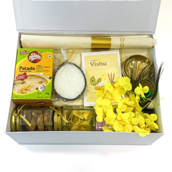 Special Vishu gift hamper embellished with Kasavu saree, Valkannadi, Kanikonna, and more - Image 2
