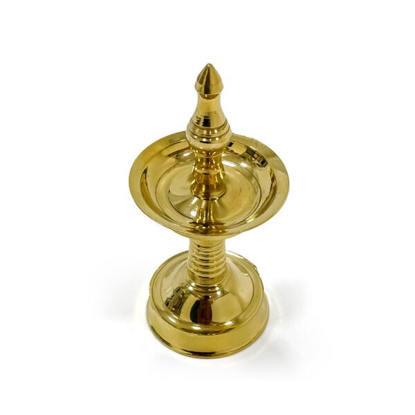 Create a divine atmosphere with a traditional brass round Nilavilakku (Height - 4.5 Inches) - Image 4