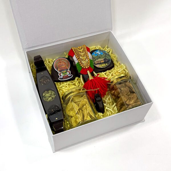 Authentic Kerala gift collection filled with elephant head decor,  Kerala spices boat, and more - Image 3
