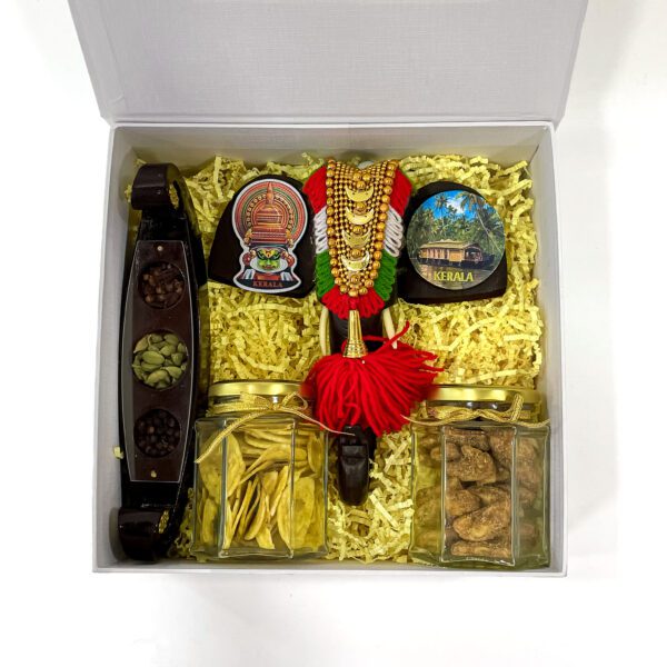 Authentic Kerala gift collection filled with elephant head decor,  Kerala spices boat, and more - Image 4